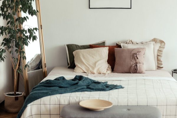 light-bedroom-rustic-interior-with-natural-materials-wooden-furniture-and-cotton-textiles-mock-up.jpg